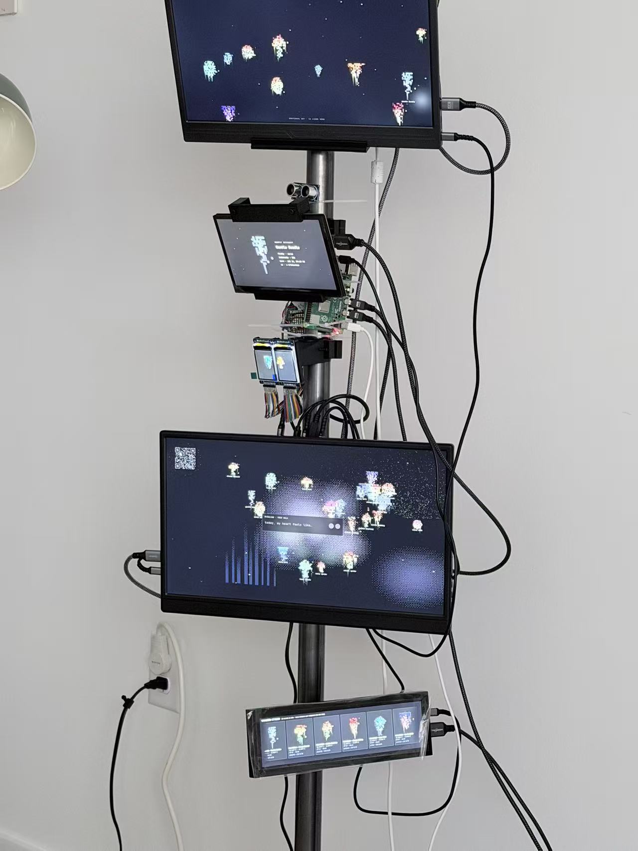 The steel tower with six screens, running